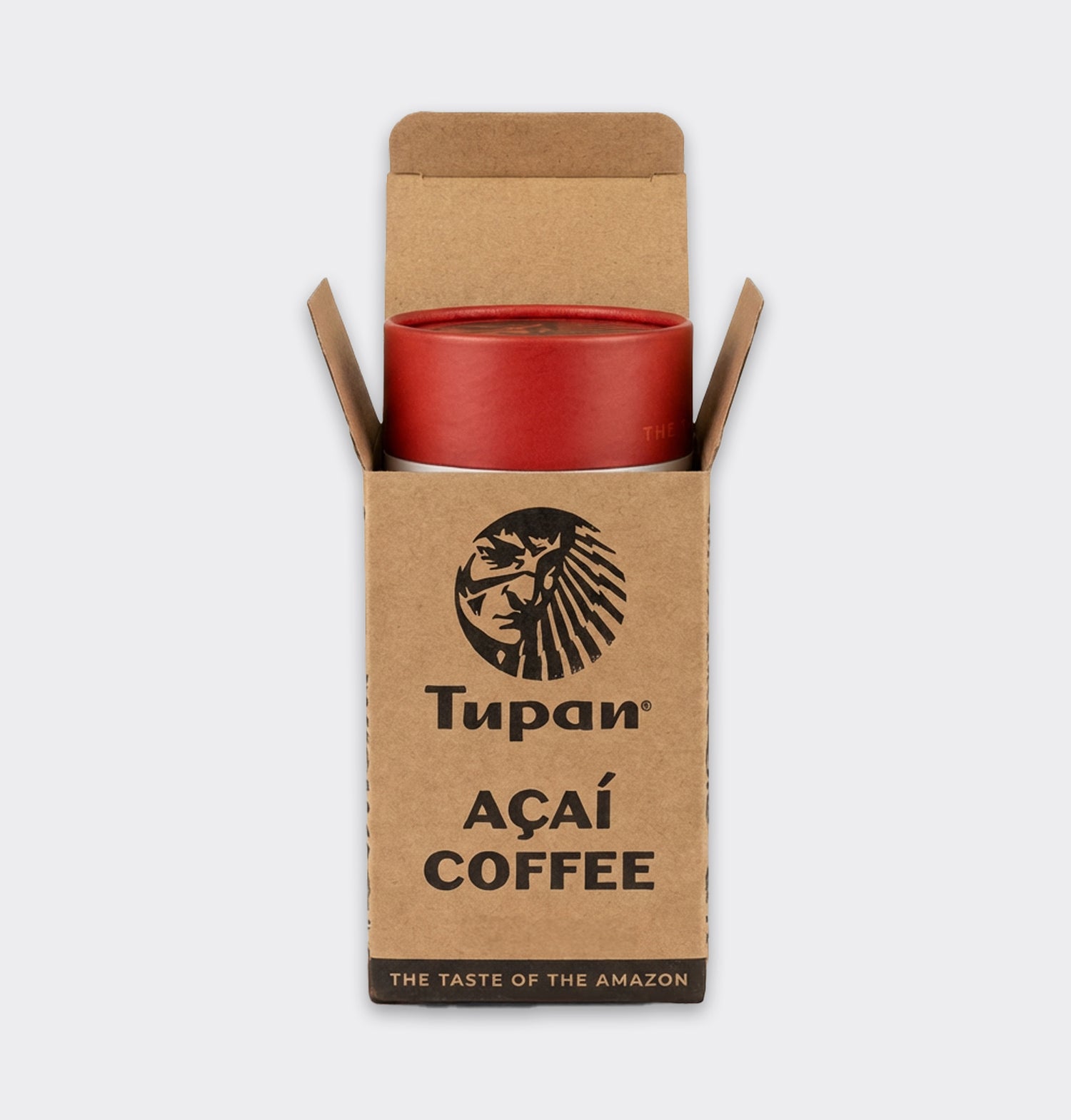 Tupan Açaí Coffee tube placed inside an open kraft box, front view on white background, sustainable Amazonian beverage made from roasted açaí beans.