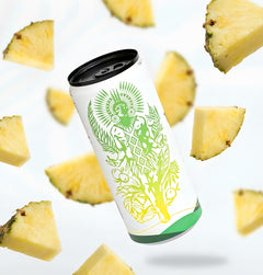 Tupan Açaí Brew Pineapple can floating on a clean white background with fresh pineapple pieces, representing a refreshing organic beverage crafted from upcycled Amazonian açaí beans and natural pineapple flavor.